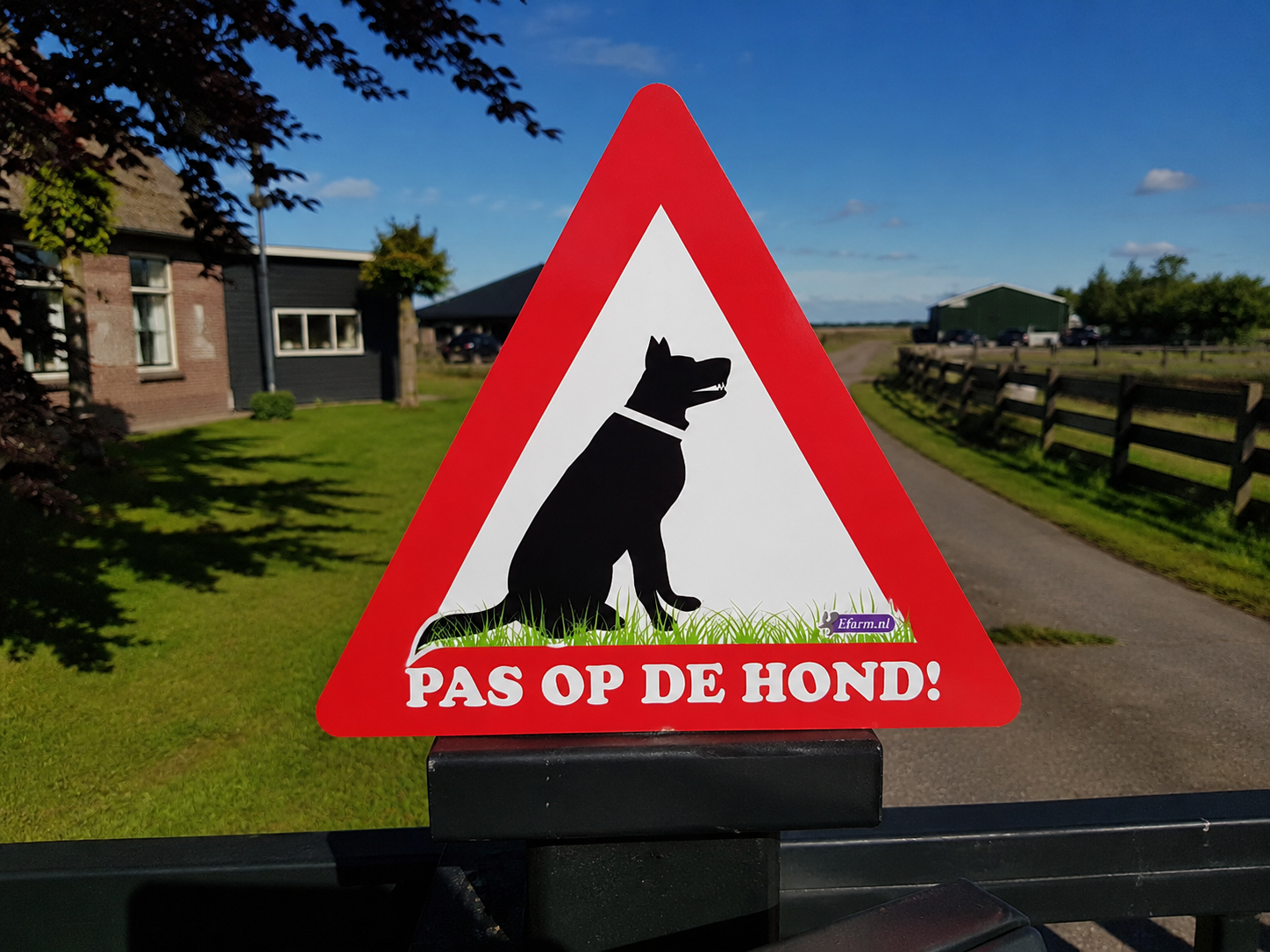 Waarschuwingsbord: Pas op de hond!